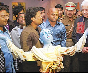 Governor M C Bhandare going round a sculpture exhibited during the foundation-day-cum-winter festival of Utkal University of Culture in Bhubaneswar.