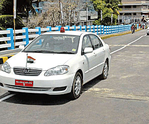 The Chief Minister’s car, the very first vehicle to pass over the Pullepady Railway Overbridge after it was opened to the public on Monday.