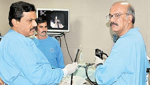 Doctors at the Asian Institute of Gastroenterology performing the first robotic flexible endoscopy scar-free surgery on a patient in Hyderabad.