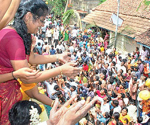 AAM AADMI: People splash the streets of Karaikal with mangoes, on the occasion of the Mangani festival, on Thursday.