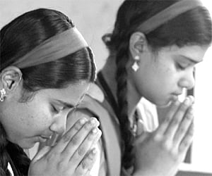 Students immersed in prayer at Cotton Hill Girls Higher Secondary School  prior to the SSLC exams, which began on Monday - Express
