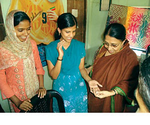 Kanchana Mala at B P Moideen Seva Mandir spending time with the many  young and destitute women whom she has helped over the past decades