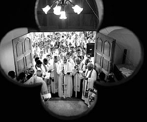Bishop Rev Thomas K Oommen re-enters the CSI Holy Trinity Cathedral church - BP Deepu