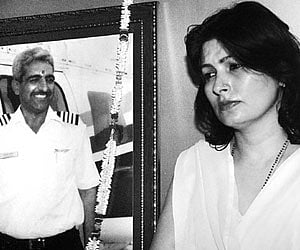 Sanjana Bhatia, wife of Capt S K Bhatia (in background picture)  who died along with YS Rajasekhara Reddy in the chopper crash in 2009.