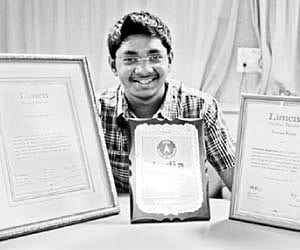 Siddharth Nagarajan, India’s youngest drummer and a holder of five national records displays his certificates at a media conference in Hyderabad on Th