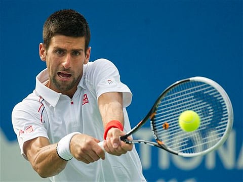Top-seeded Djokovic advances at rainy Rogers Cup