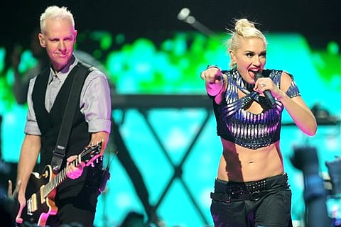 Gwen Stefani and Tom Dumont of 'No Doubt' perform at the iHeart Radio Music Festival in Las Vegas. (Photo by Eric Reed/Invision/AP)