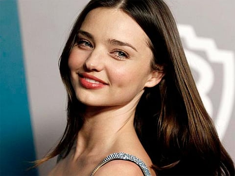 'Fearless' Miranda Kerr Packs PDA with Evan Spiegel