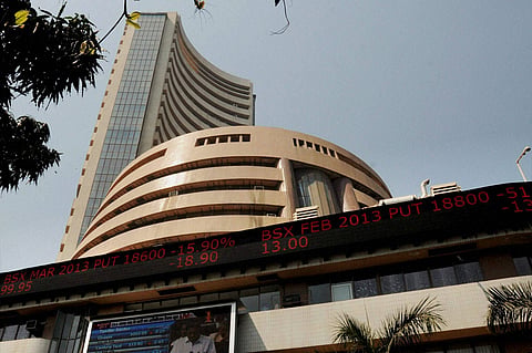 Sensex at nearly 2-month low; slumps 298 points on weak Rupee