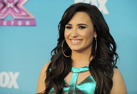 Demi Lovato sells own clothes for charity