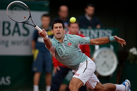 Djokovic opens bid for first French title with win 
