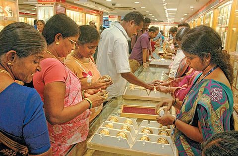 Spiralling rupee clamps down on golden spree 