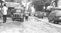 Potholed road lands commuters in a fix