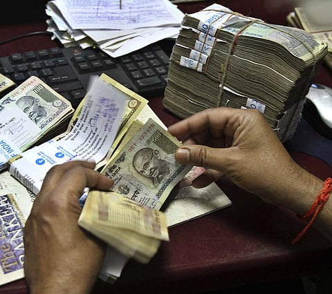 Rupee recovers from record low; up 19 paise against dollar