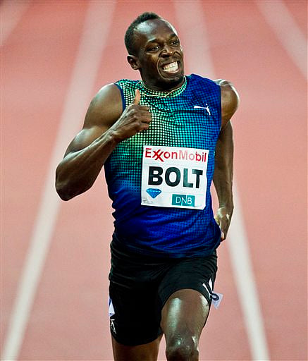 Bolt comes back in style, wins with world leading time