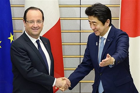 Japan, France to tighten nuclear, defense ties