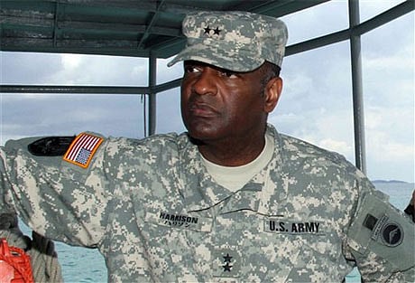 Army suspends general linked to sex-assault probe
