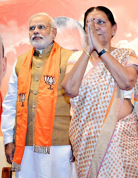 Anandiben Sworn in as Gujarat's First Woman CM, Four New Faces in 21-member Ministry