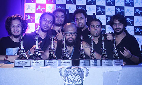Guitarist Proves Mettle, Wins  Metal Award for His Band