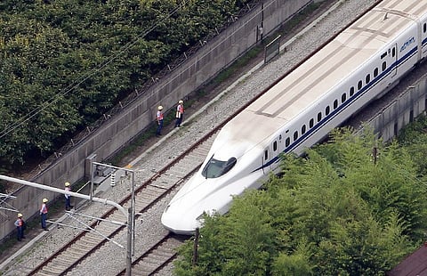 This aerial view shows a Nozomi 255 bullet train, or "shinkansen", stopped near the Odawara station in JApan. |File Photo: AFP