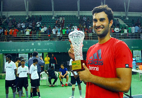 India's Yuki Bhambri pose with trophy after won match against E. Donskoy RUS by 6-2 6-6 7-4 in Final match of KPIT-MSLTA ATP Challenger in Pune i on Wednesday. | PTI