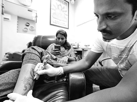 He Finds His Bliss in Tattooing You 
