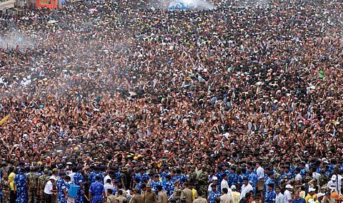 Devotees during Nabakalebara Rathyatra in Puri on Saturday.