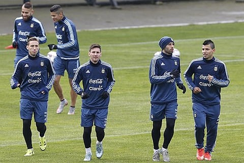 Argentina's Lucas Biglia, front, from left to right, Lionel Messi, Javier Mascherano and Sergio Aguero, jog during a training session in Concepcion, Chile. |AP