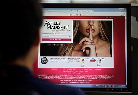 FILE - In this June 10, 2015 photo, Ashley Madison's Korean website is shown on a computer screen in Seoul, South Korea | AP