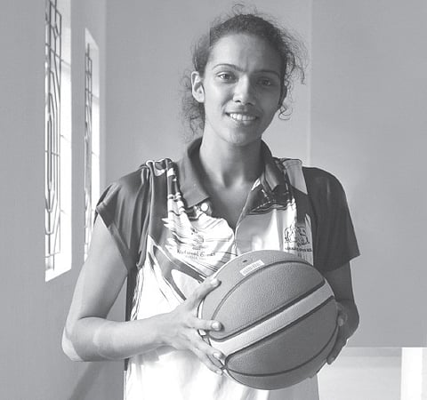Shooting Hoops Comes  Effortlessly to Her