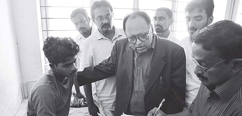 State Police Complaints Authority chairman Justice K Narayana Kurup taking the statement of Sooraj who has been admitted to Kalamassery Medical College after being allegedly tortured by the police  |