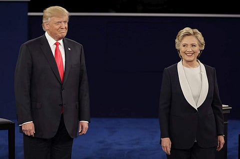 Republican presidential nominee Donald Trump stands next to Democratic presidential nominee Hillary Clinton during the second presidential debate. (Photo | AP)