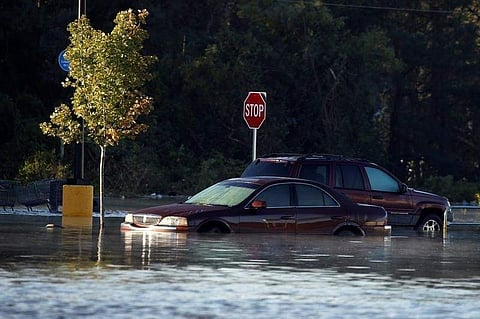 Flooded cars are pictured after Hurricane Matthew passes in Lumberton, North Carolina | Reuters
