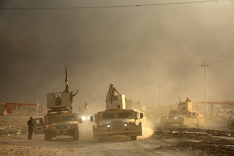 An Iraqi military convoy advances towards the city of Mosul, Iraq, Wednesday, Oct. 19, 2016.  | AP