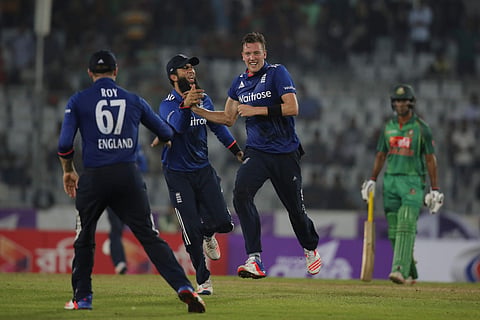 England's Jake Ball, second right, celebrate with his teammates after the dismissal of Bangladeshâs Taskin Ahmed during the first ODI match between England and Bangladesh | AP