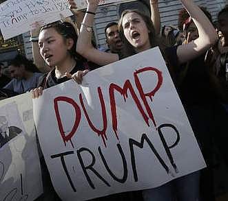 Mission High School students Hope Robertson, right, yells as she protests with other high school students in opposition of Donald Trump's presidential election victory in front of City Hall. | AP