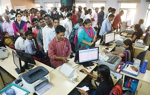 People queue up at Greenlands eSeva centres to pay utility bills with old notes in Hyderbad on Friday | R SATISH BABU