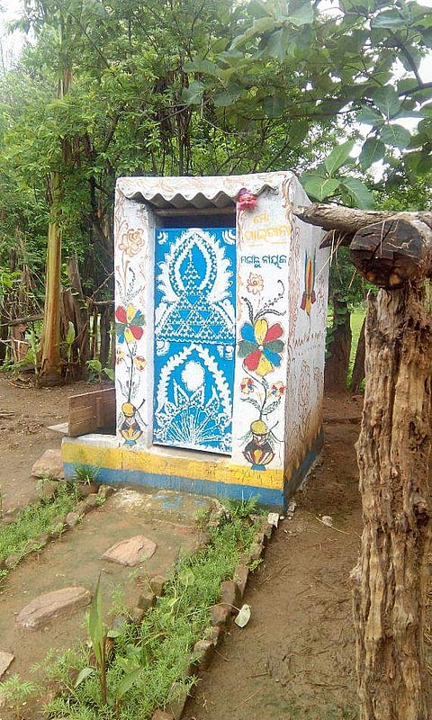 One of the toilets with colourful designs on it's walls. | Express Photo Service