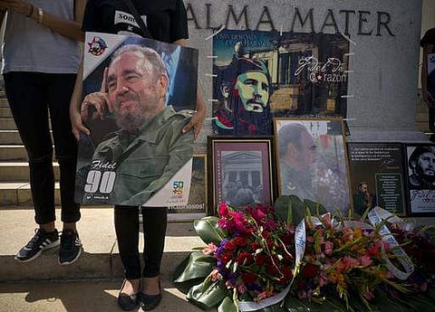 People with images of Fidel Castro gather one day after his death in Havana. ( Photo | AP)