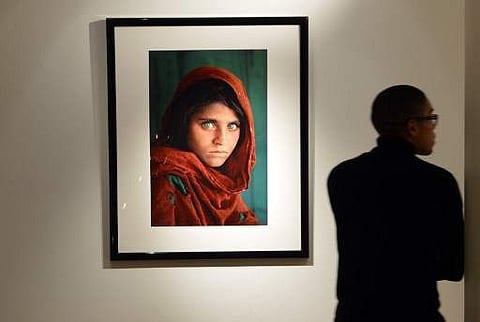 'Afghan Girl, 1984' by photographer Steve McCurry. (File photo | AFP)
