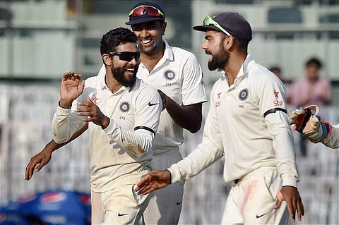 India's Ravindra Jadeja celebrates along with teammates the dismissal of England's Jonny Bairstow during their first day of the fifth cricket test match at MAC Stadium in Chennai on Friday. | PTI