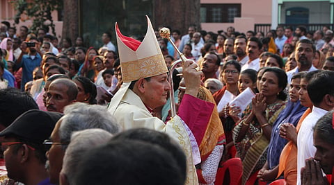 New Archbishop of Verapoly Archdiocese Joseph Kalathiparambil sprinkling holy water on the faithful after the  rite of Episcopal ordination at Vallarpadam Basilica on Sunday| Albin Mathew