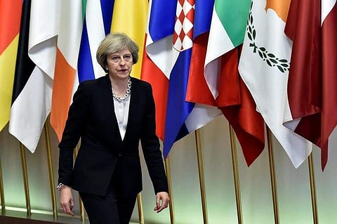 Britain's Prime Minister Theresa May leaves a EU Summit at the European Council headquarters in Brussels, Belgium December 15, 2016. REUTERS