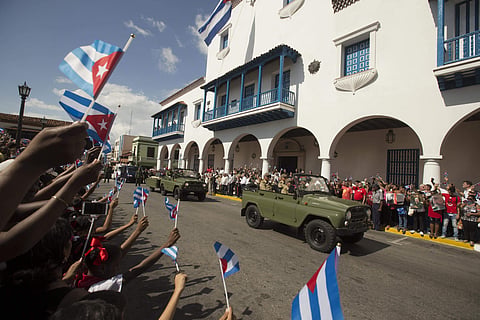 The caravan driving the ashes of Cuba's leader Fidel Castro arrives at the Cespedes Park in Santiago, Cuba, Saturday, Dec. 3, 2016. | AP