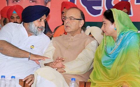 A file photo of Union ministers Arun Jaitley and Harsimrat Kaur and Punjab Deputy Chief Minister Sukhbir Badal (L) at the recent NDA Vikas Parv rally in Bathinda