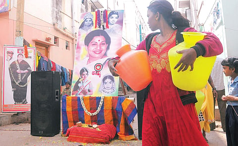 Posters and banners of Jayalalithaa were put up in Pantharapalya, Bengaluru, on Tuesday, following her death on Monday  | vinod kumar t