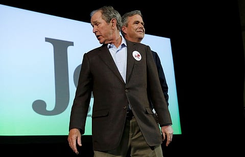 Former U.S. President George W. Bush (L) joins his brother Republican U.S. presidential candidate Jeb Bush (R) on the campaign trail for the first time in the 2016 campaign at a rally in North Charleston, South Carolina February 15, 2016. | Reuters