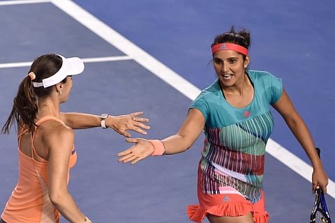 Switzerland's Martina Hingis and India's Sania Mirza (R). (File|AFP)