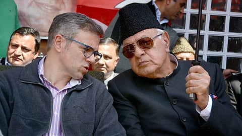National Conference chief Farooq Abdullah R with Chief Minister  Omar Abdullah.