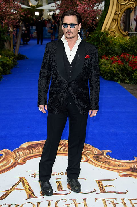 U.S actor, Johnny Depp poses for photographers upon arrival at the European premiere of the film 'Alice Through The Looking Glass' at a central London cinema, London, Tuesday, May 10, 2016. | AP